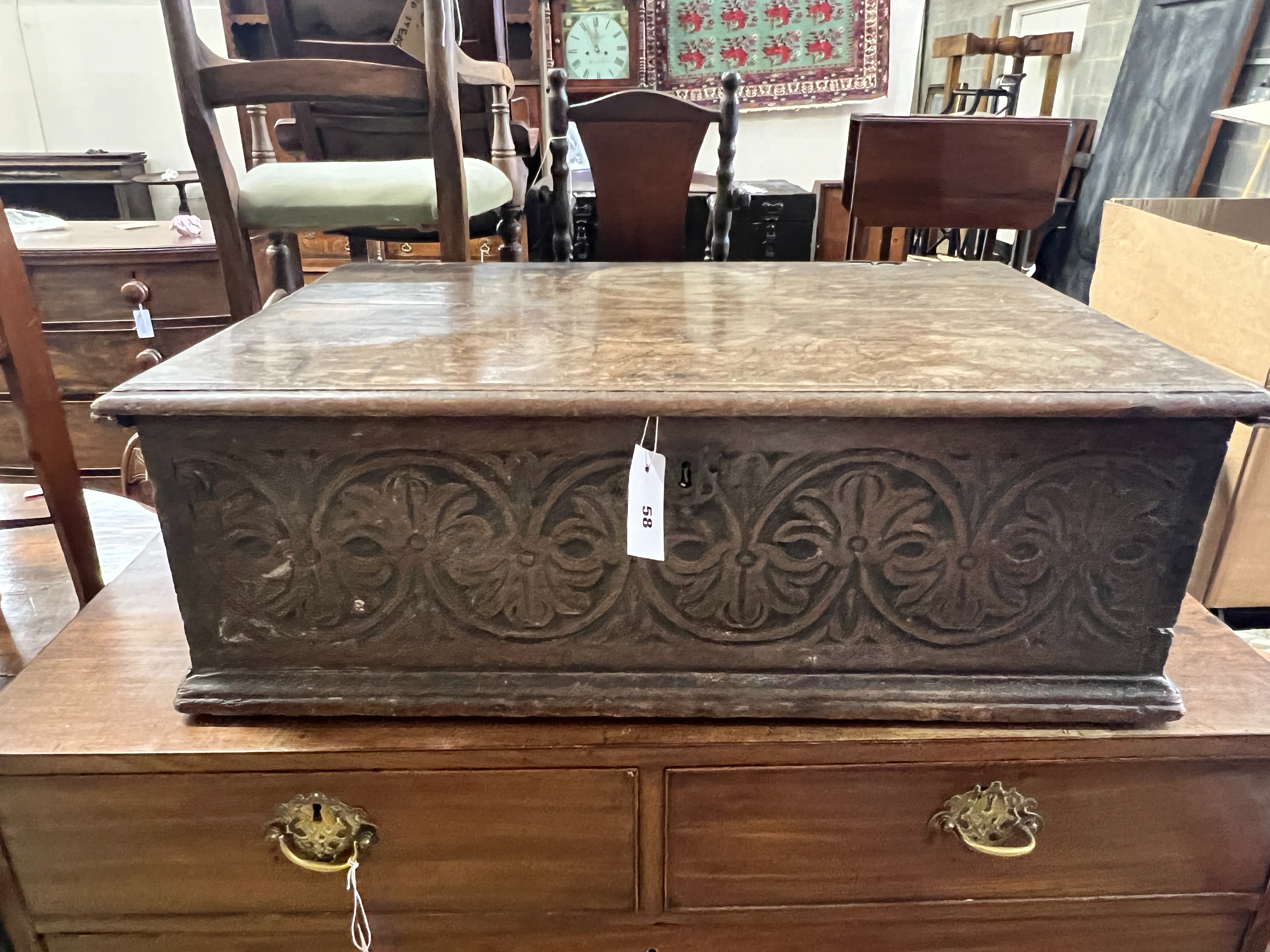 An 18th century carved oak bible box, length 76cm, depth 49cm, height 26cm